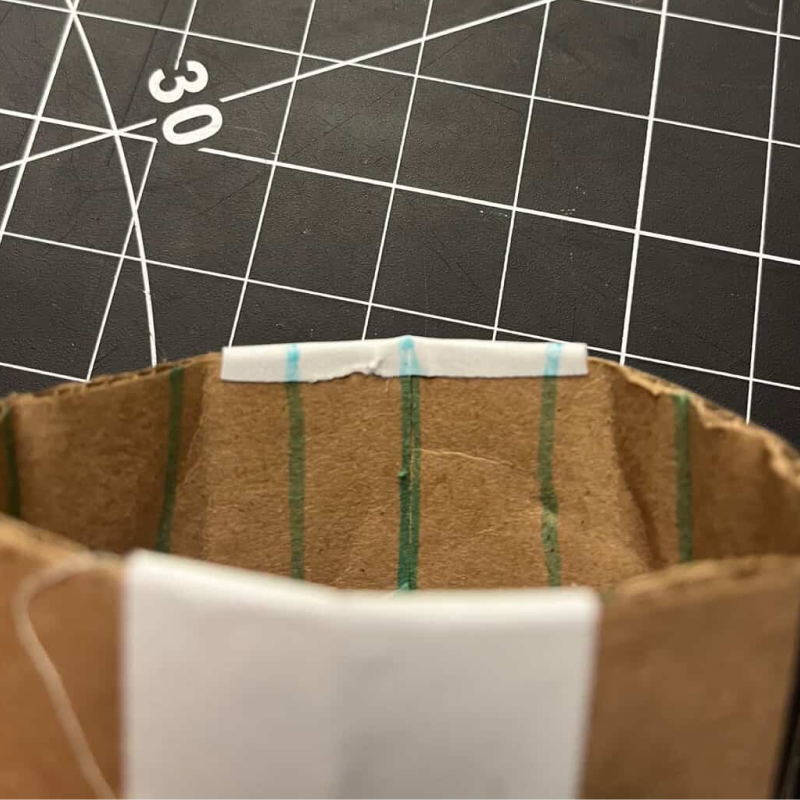 Building the container to fit the gear and allow it to turn securely.